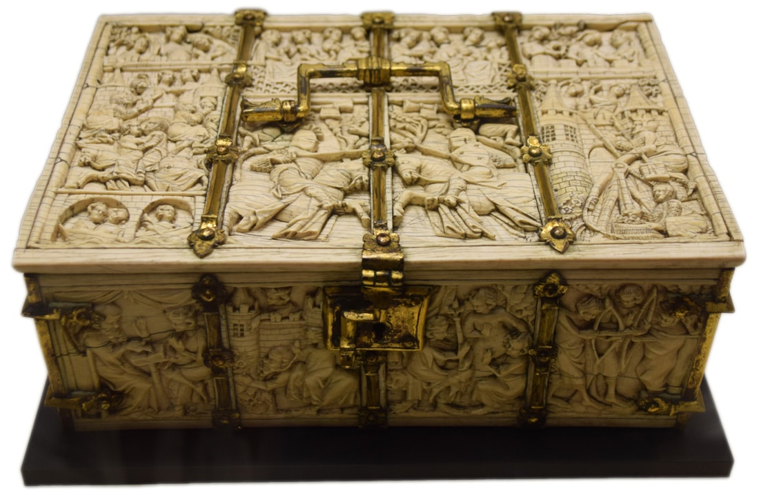Coffret : l'assaut du château d'Amour et scènes de romans. Paris vers 1300-1310 Ivoire d'éléphant, ferrures en alliage cuivreux. Conservé au musée de Cluny sous le n° CL. 23840